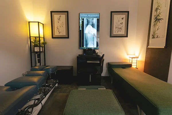 Chiropractic Eden Prairie MN Massage Room A treatment room at Zen Chiropractic bathed in soft, comforting light