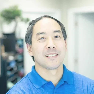Chiropractor Eden Prairie MN Zen Matsuda Meet the Team A professional headshot photo of Dr. Zen Matsuda